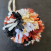 Calico cat patterned, white, cream, orange, brown, and black spots