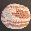 cream planet with brown patches