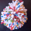 White with multicoloured speckles