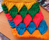 Five colours rows of textured triangles