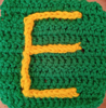 Green square with yellow letter E