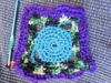 Blue center, greens, and purple edge