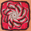 Grey, red and black spiral flower