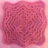 Pink square that builds out from a diamond in the middle