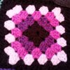 traditional square in purple, pink, white, and black