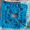 Bright blue square with partial pale blue border