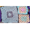 3 squares: one light blue square with dark blue ring, two quarter-size squares in turquoise, cream, and pink