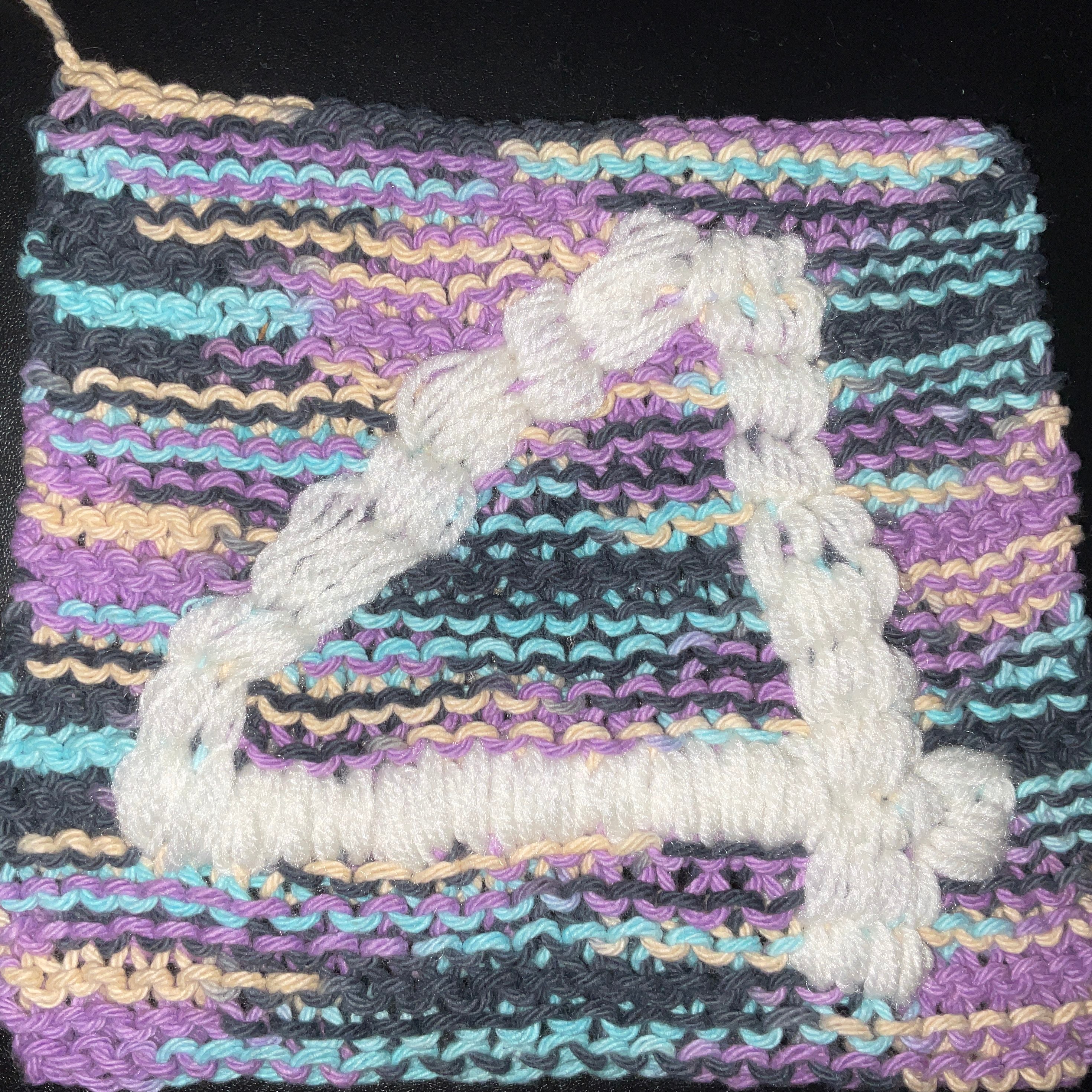 Variegated purple, black, yellow and blue background with white number 4