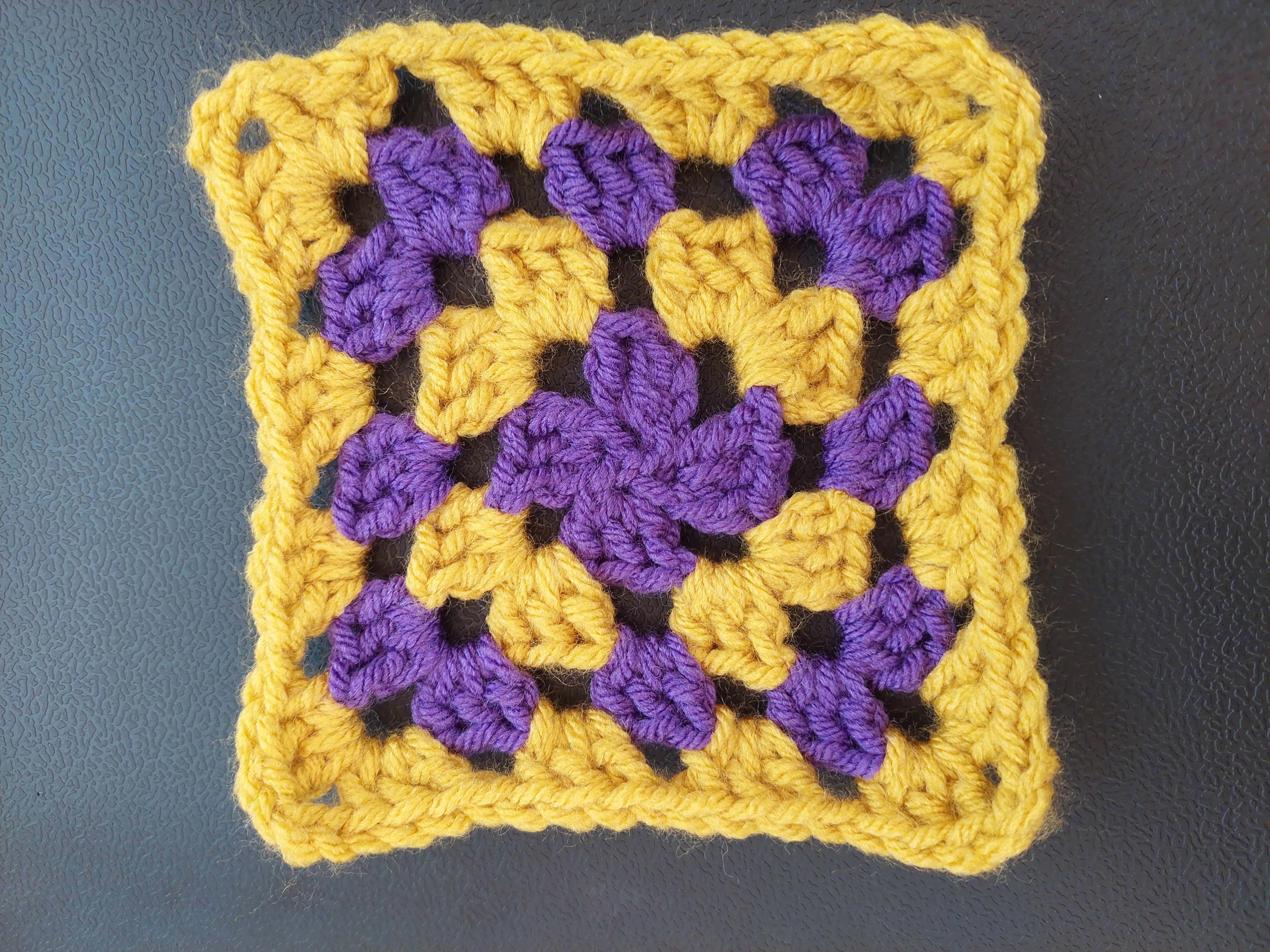 purple and yellow striped square
