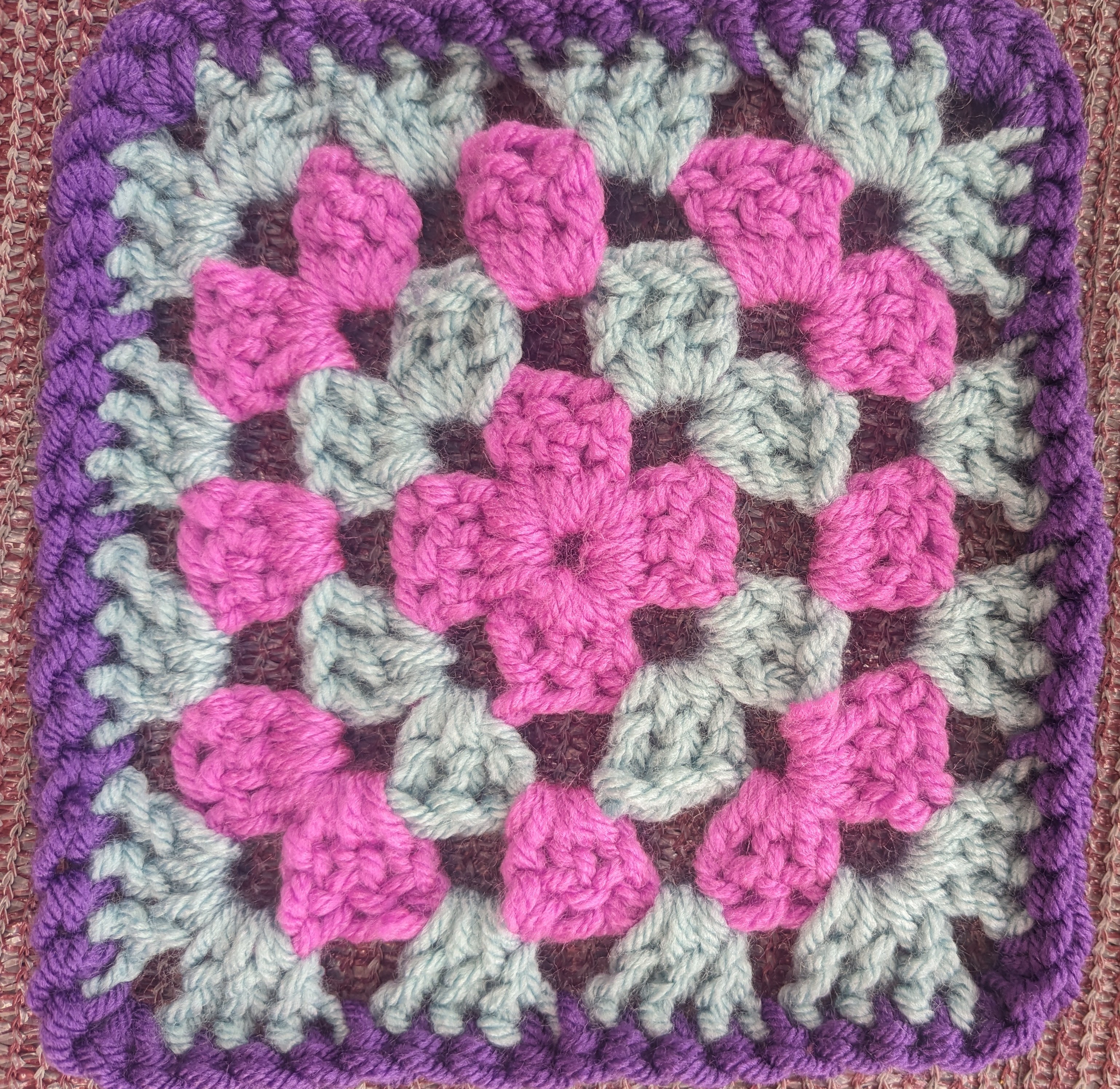 Pink and blue alternating square with purple border