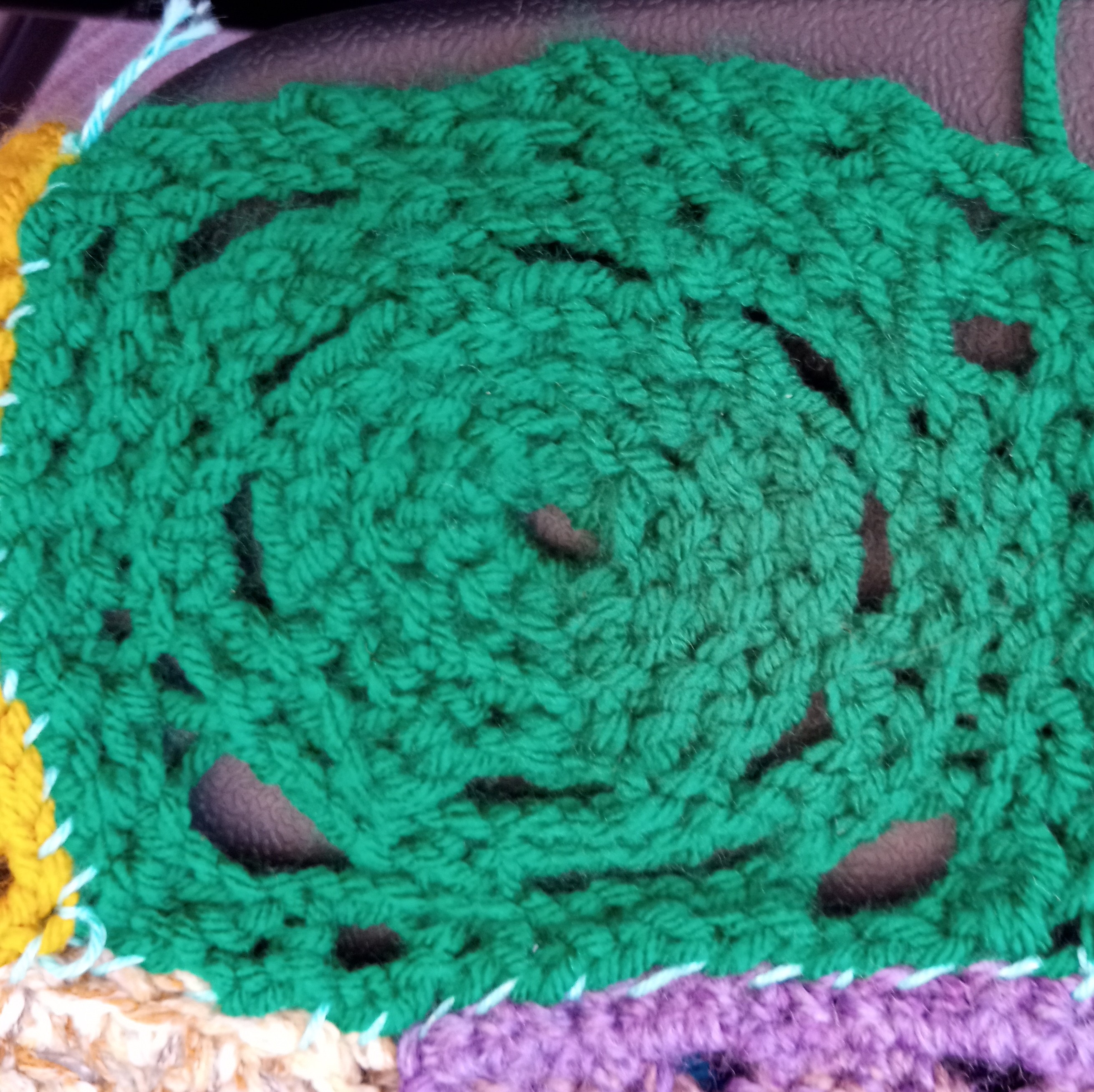 Green square with circle at centre