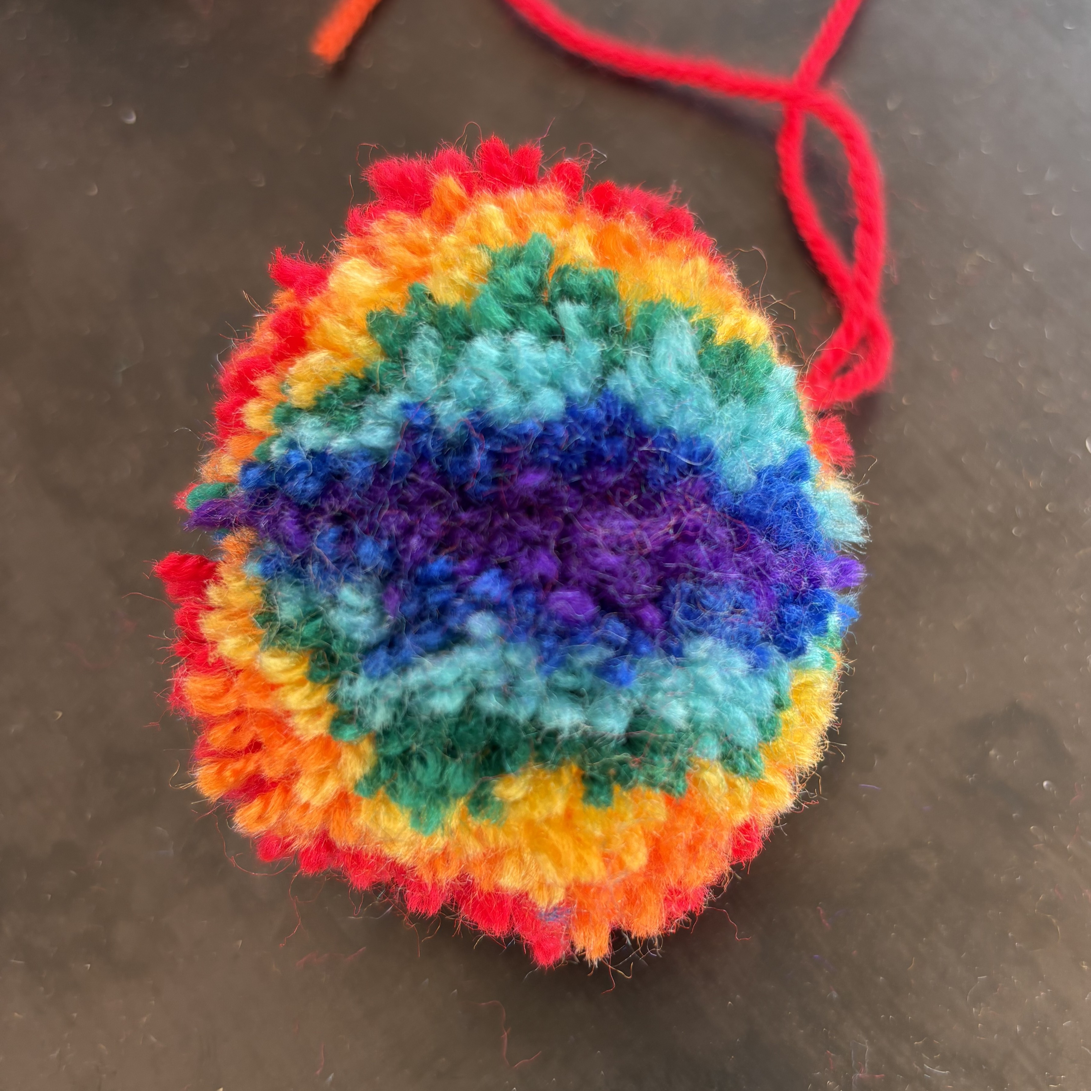 Radiates colours in the visible light spectrum