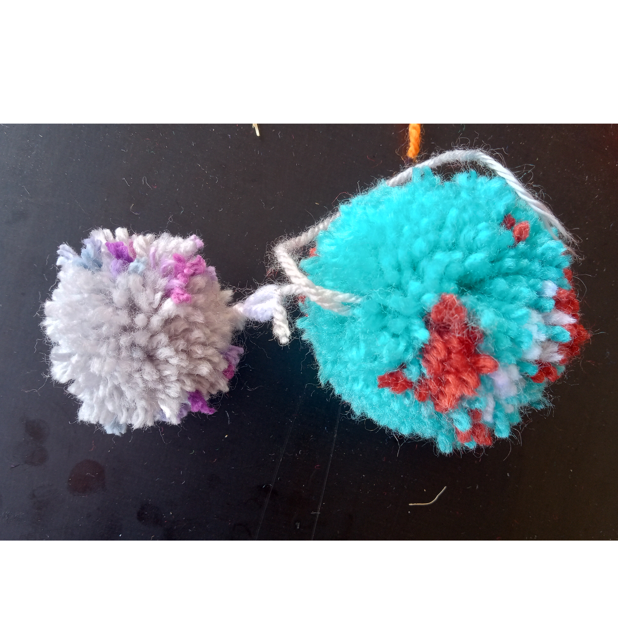 Small red planet with large blue oceans and some white ice, with a grey moon with large purple crystals.