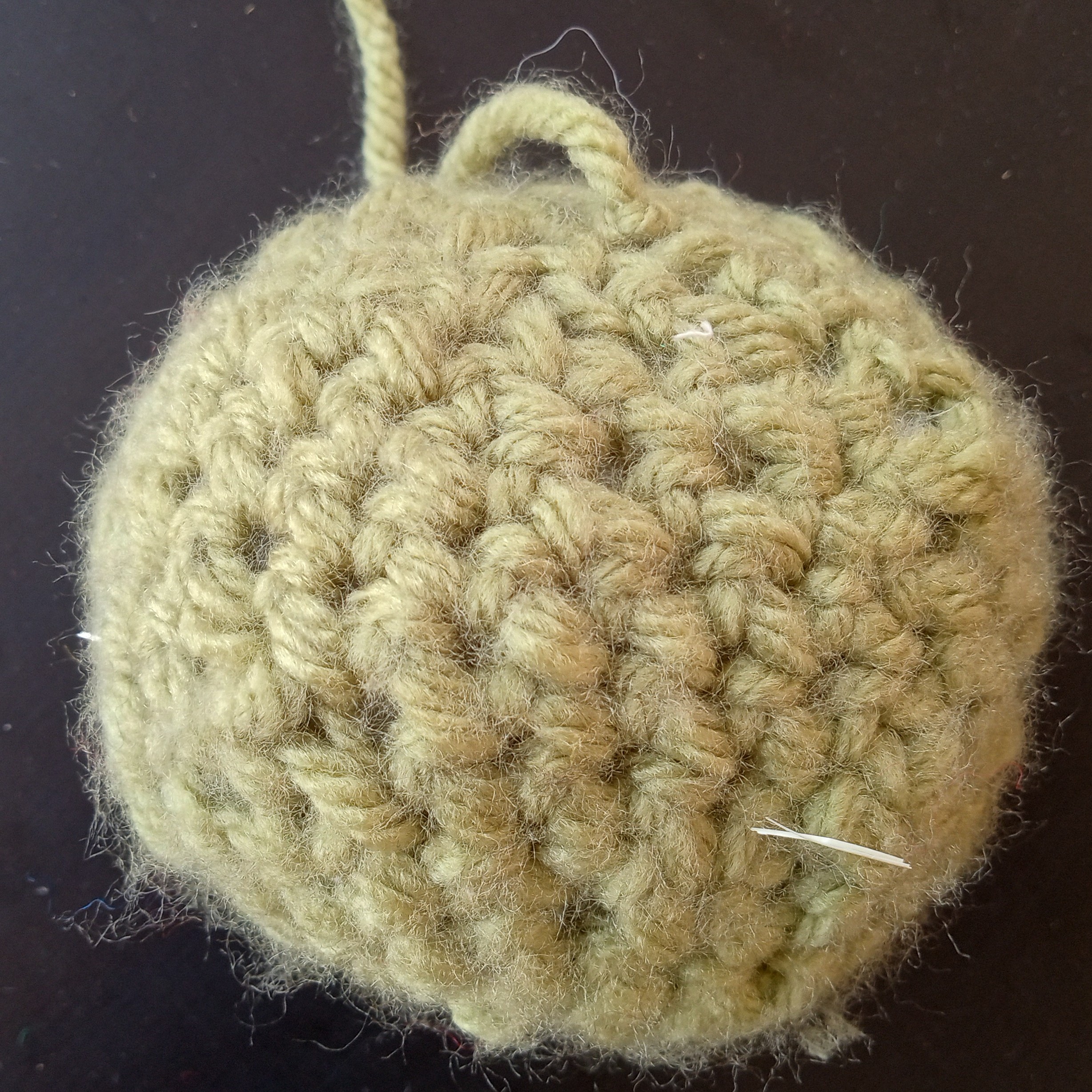 Sage green crochet planet