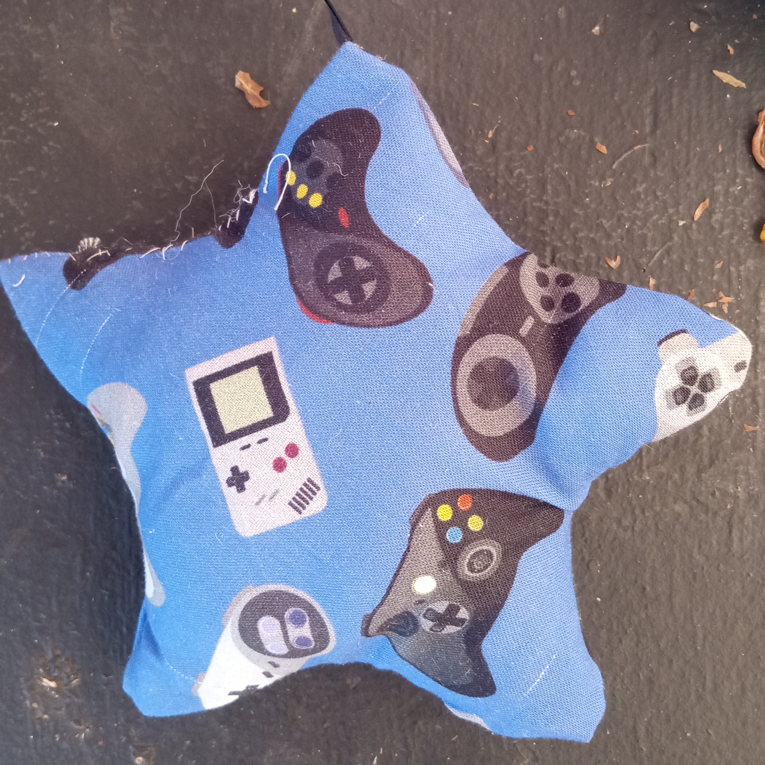 five pointed star with video game controller fabric